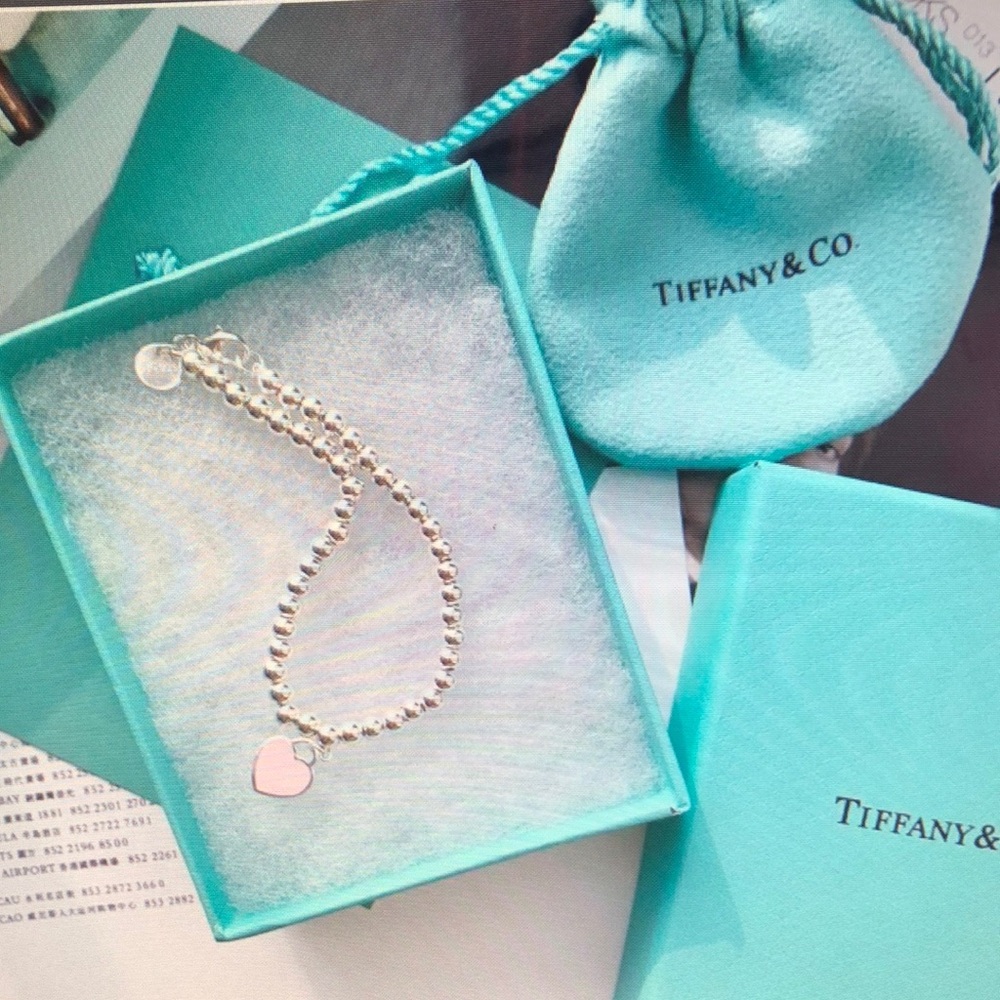 Tiffany & Co. Silver Bracelet with Pink Heart Charm